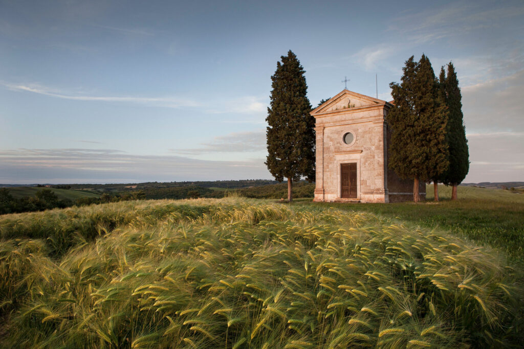 Cappella della Vitaleta chapel surrounded by cypress trees Val d’Orcia Tuscany near Villa Montelandi