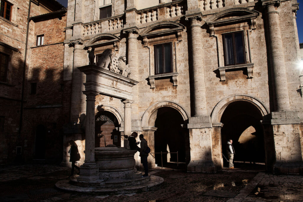 Porta del Popolo gate in Montepulciano old town, Val d’Orcia Tuscany heritage site