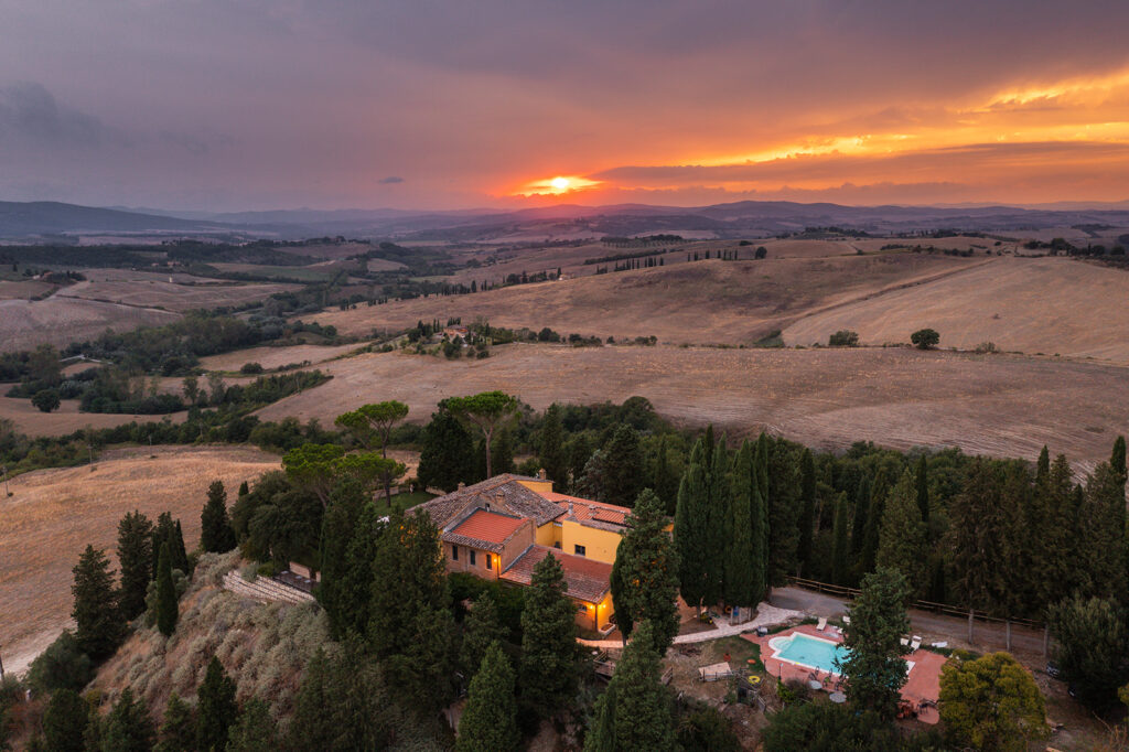 Panoramic pool at Villa MonteLandi surrounded by Tuscan countryside—perfect for relaxing and enjoying the view.
