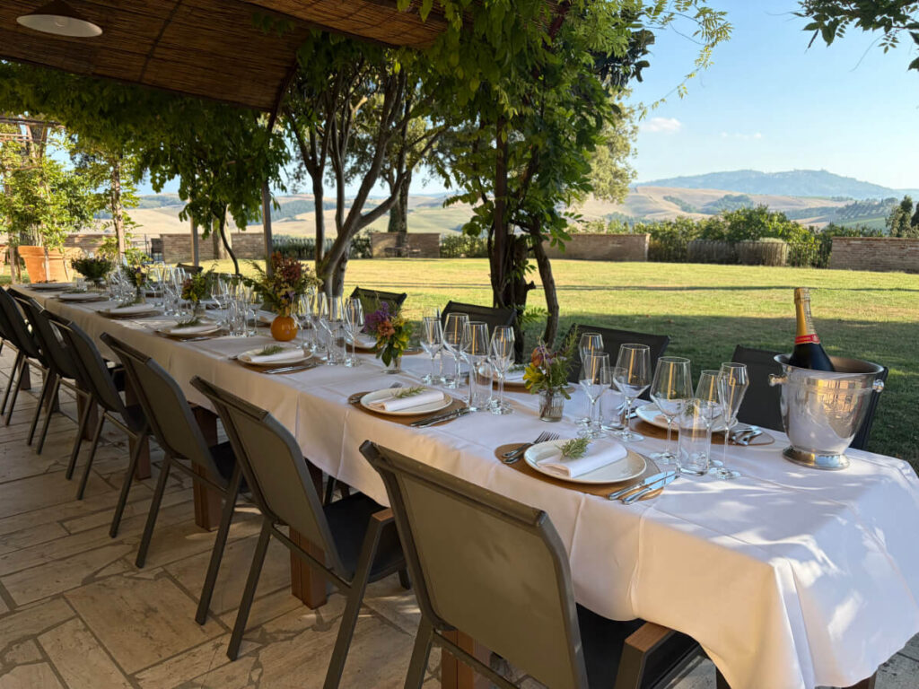 elegant dinner table terrace montelandi montalcino