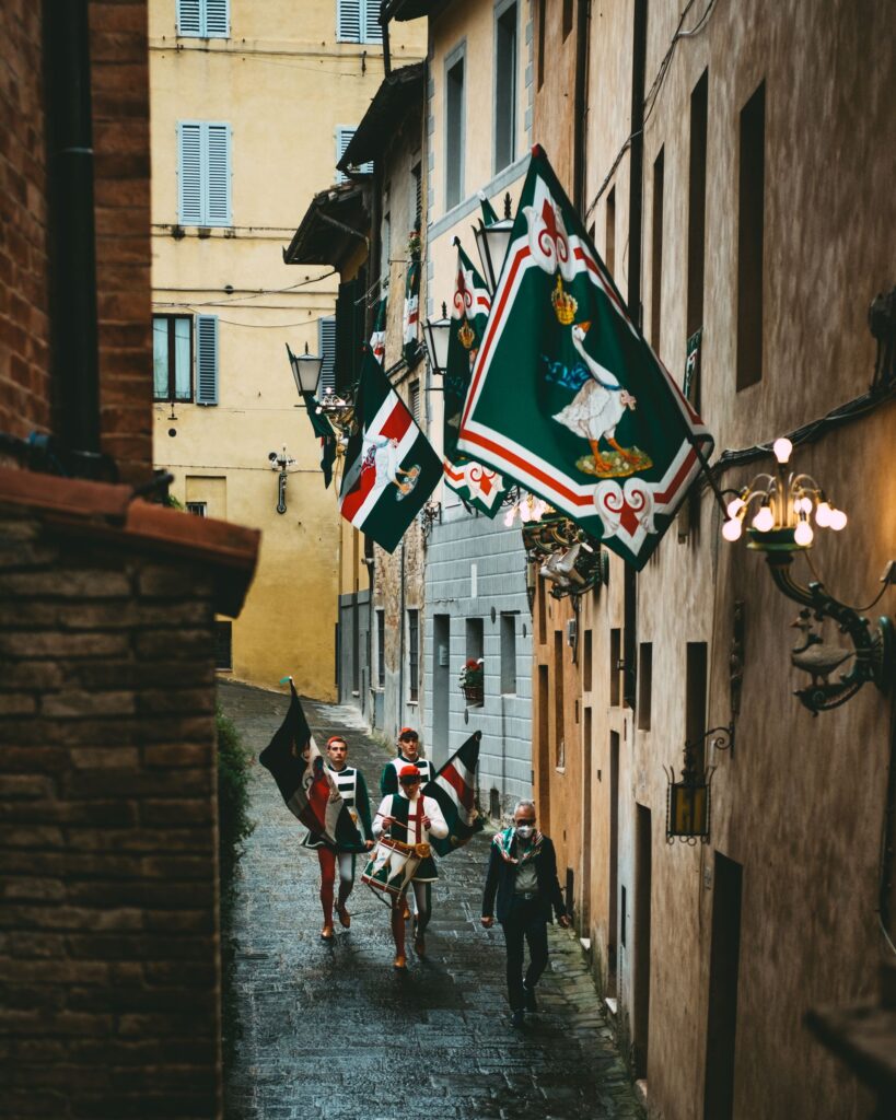 siena palio traditional horse race contrada Flagg thrower drummers